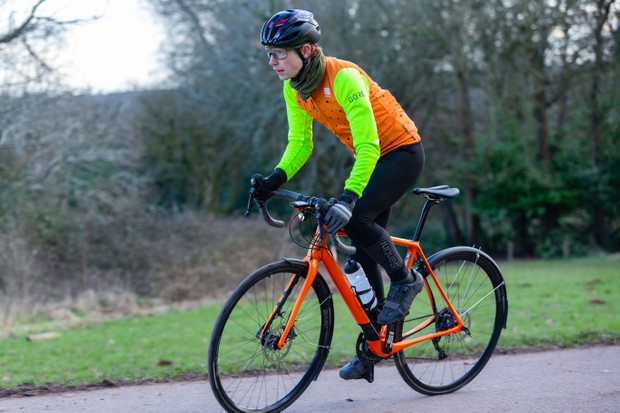 Felix Smith riding the Cannondale Synapse endurance road bike with mudguards and lights